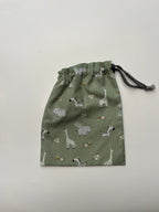 Bolsa impermeable para merienda animales fondo verde