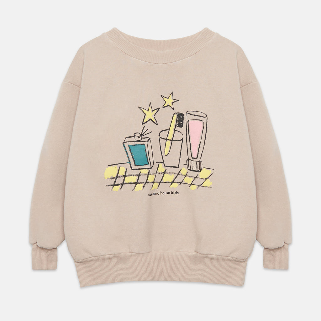 Sudadera arena estampado cepillo mágico