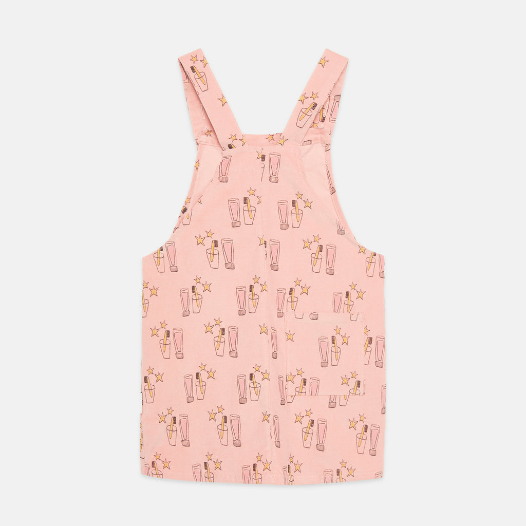 Vestido-peto rosa con estampado cepillo mágico