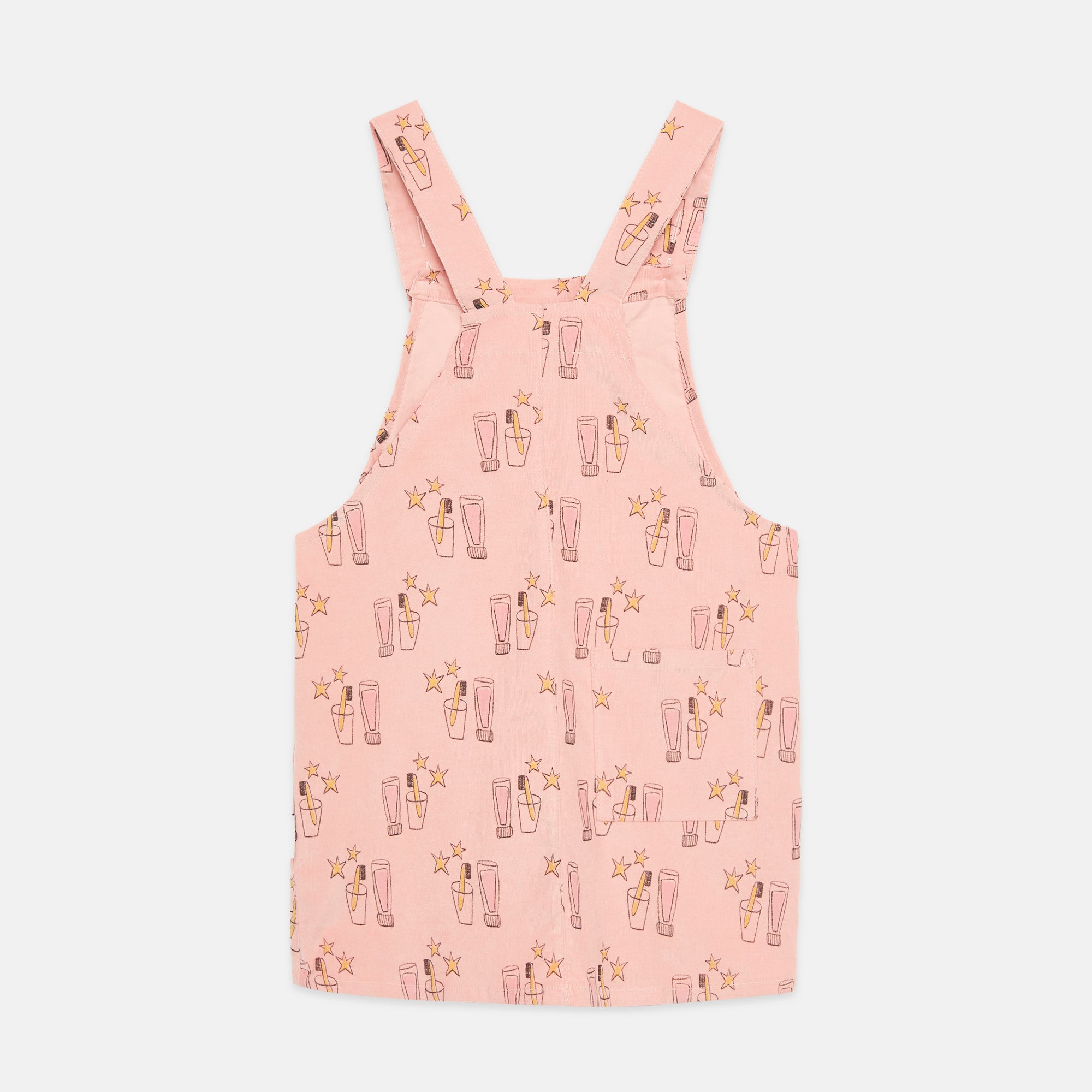 Vestido-peto rosa con estampado cepillo mágico