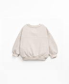 Jersey beige con puños