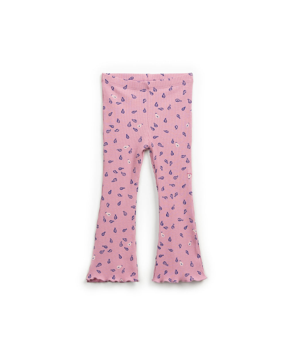 Legging rosa con estampado azul y volante