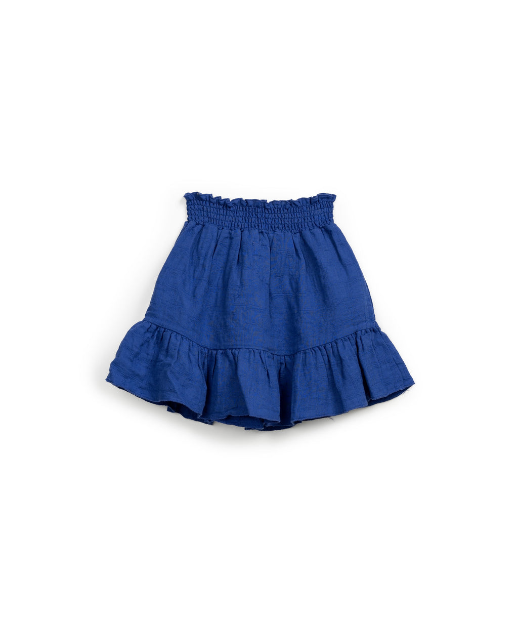 Falda azul con volante de algodón y lino
