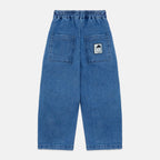 Pantalones denim pom pom