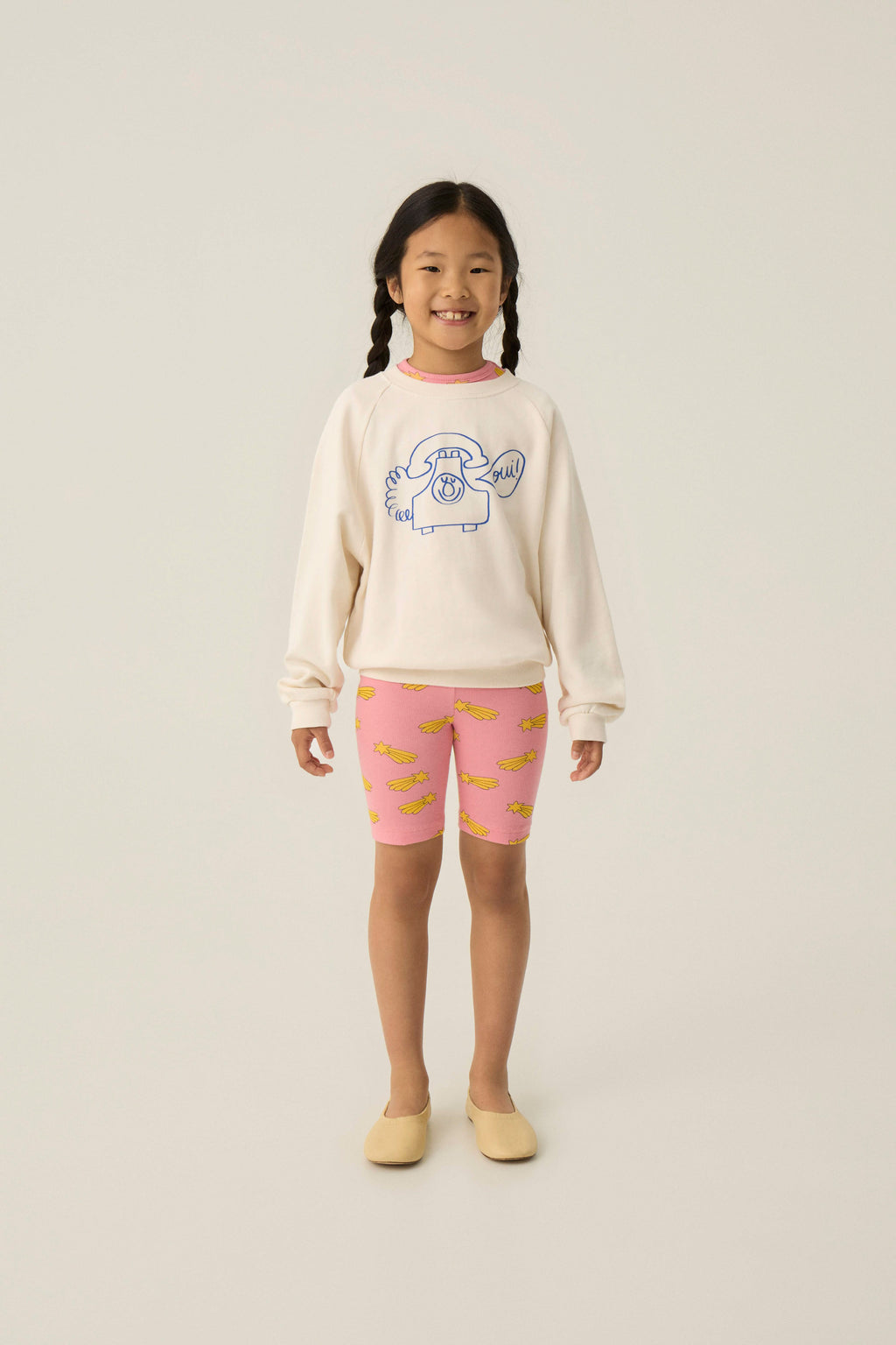 Legging ciclista rosa con estrellas amarillas The Campamento