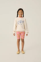 Legging ciclista rosa con estrellas amarillas The Campamento