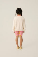 Legging ciclista rosa con estrellas amarillas The Campamento